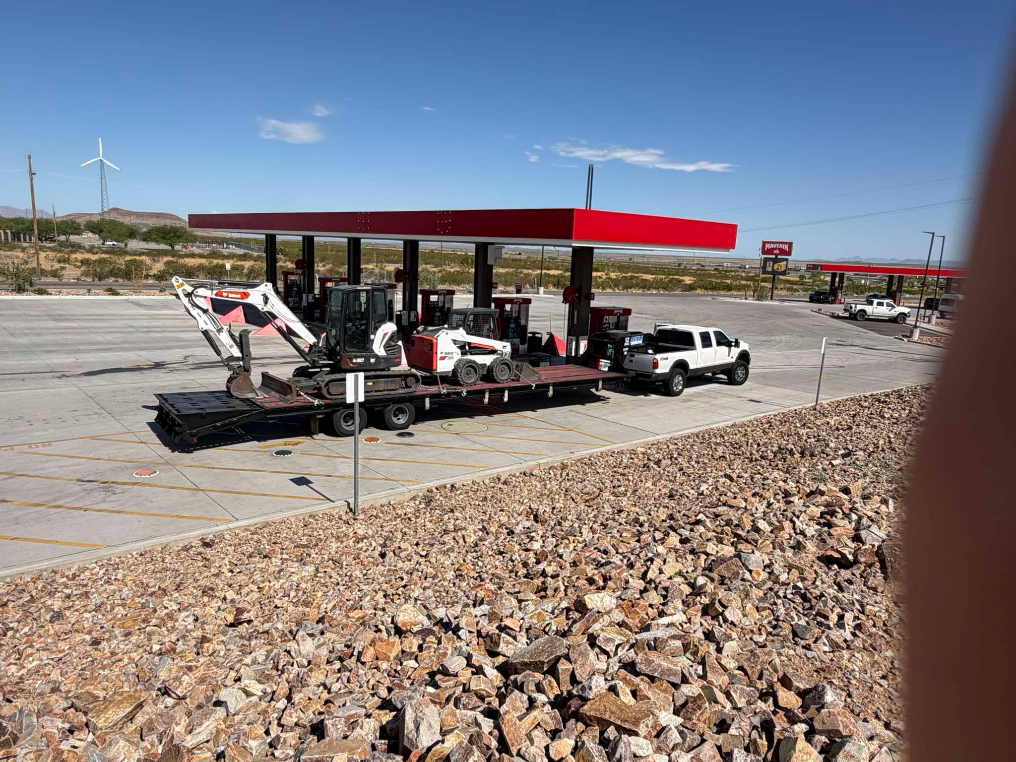 BNRB hauling a Bobcat mini excavator and skid steer